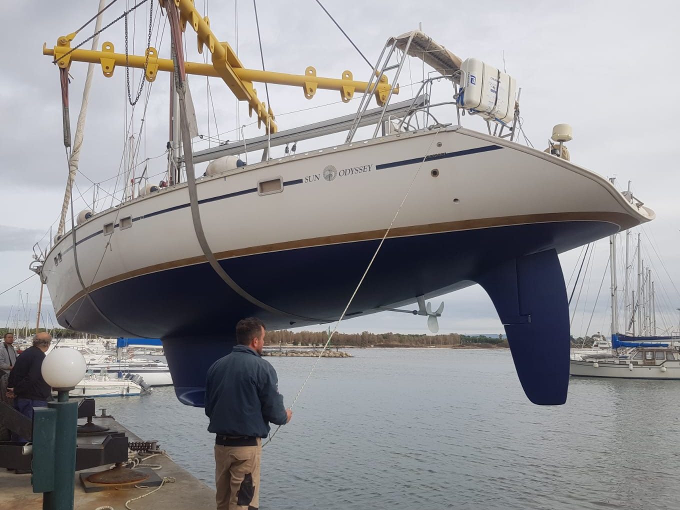 sun odyssey sailboat being launched after renovation
